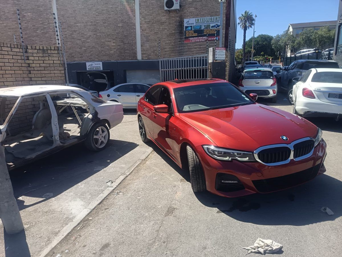 BMW 3 Series after full respray, finished in red