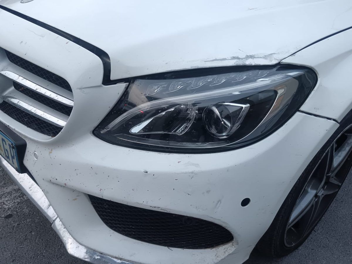 Mercedes C-Class front bumper damage before repair